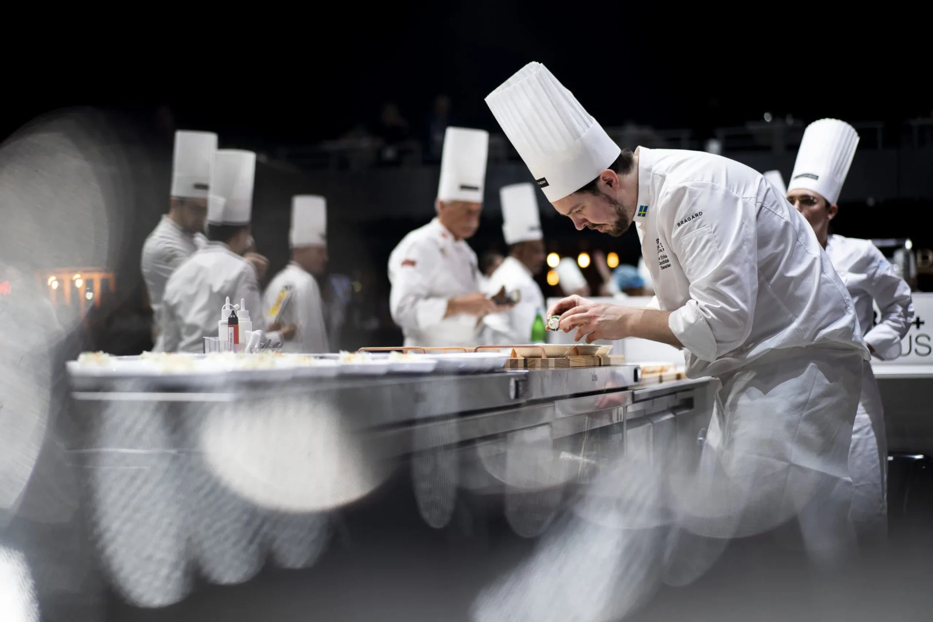 Jimmi Eriksson working at the competition bench during Bocuse d'Or 2023