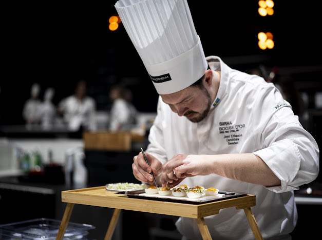 Close-up of Jimmi Eriksson plating during Bocuse d'Or